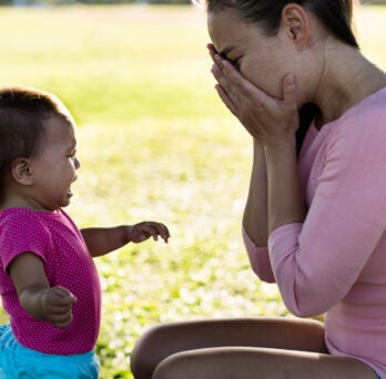 Mother and child crying 