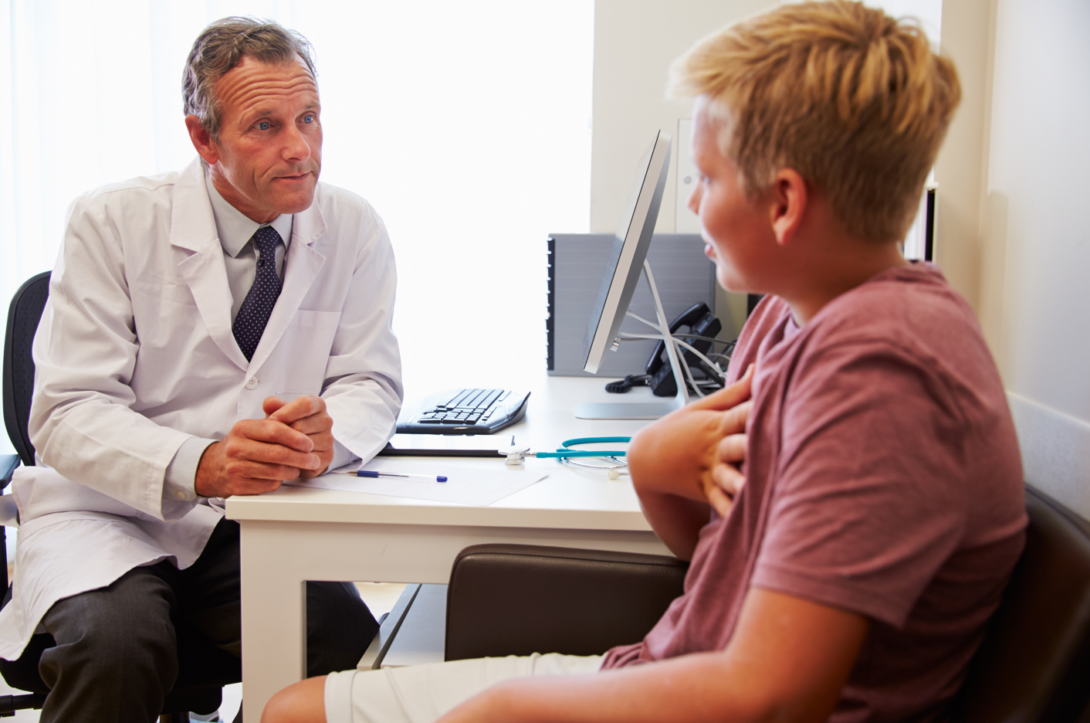 health care provider talking to child